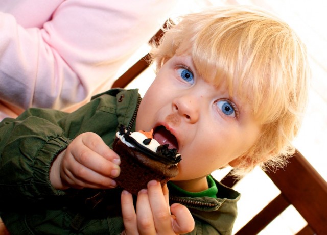 boy eating cupcake 