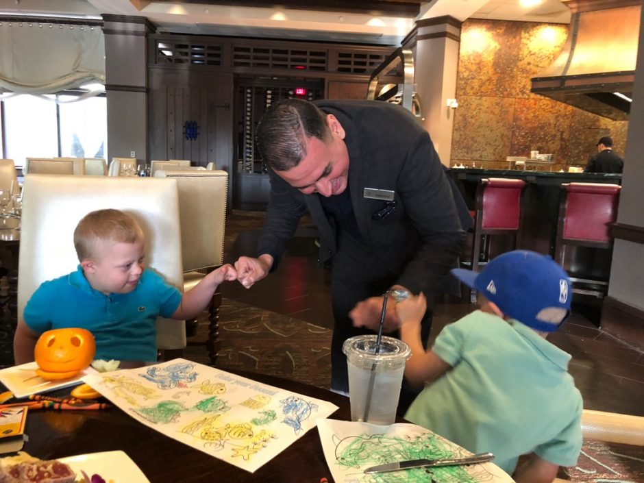 manager greeting kids deep blue seafood grille