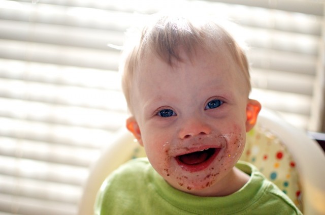 smiling kid laughing down syndrome