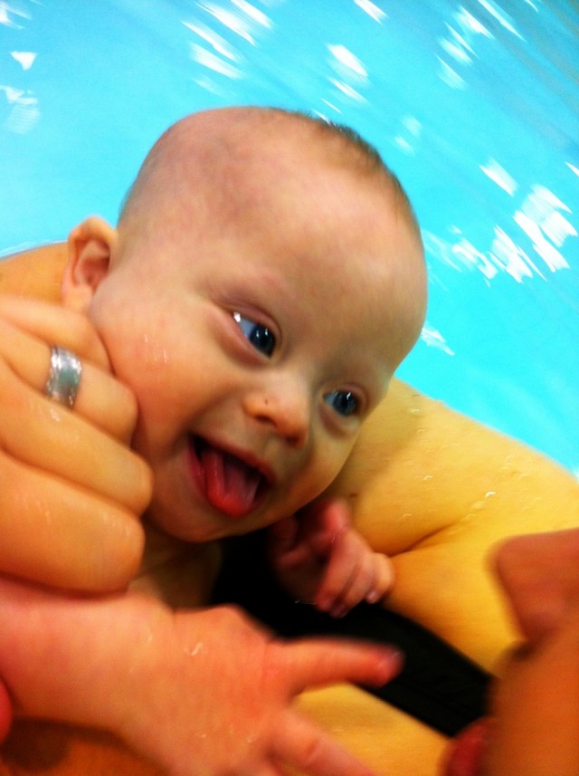 Our little guy loves to smile and swim!