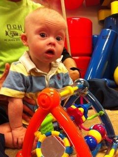 Our son born with Down Syndrome at Physical Therapy