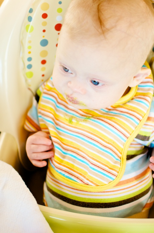 down syndrome baby boy cute eating feeding chair