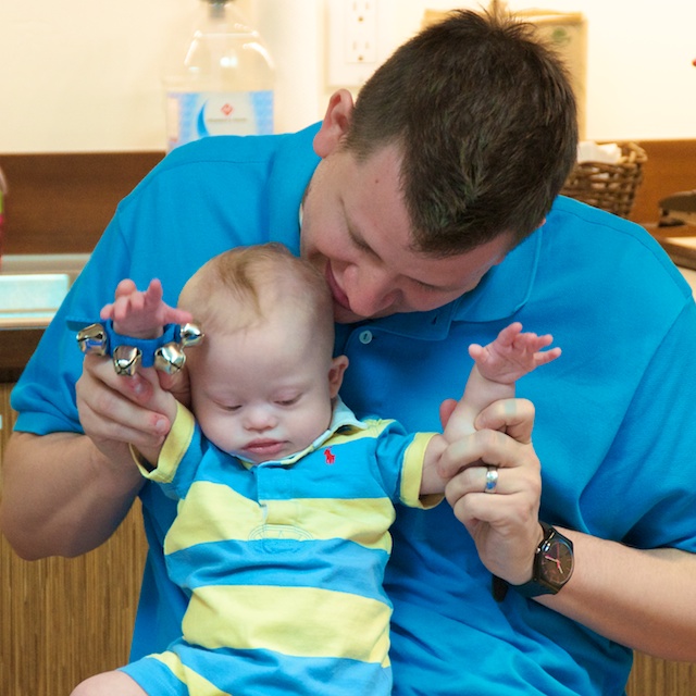 library story time down syndrome baby boy ring bells