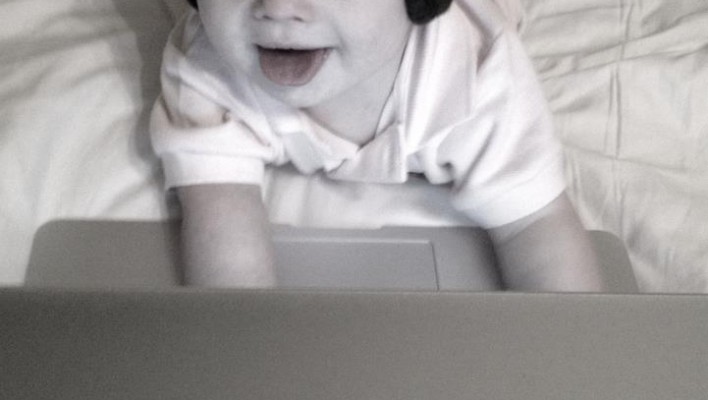 Baby born with Down syndrome special needs using macbook air