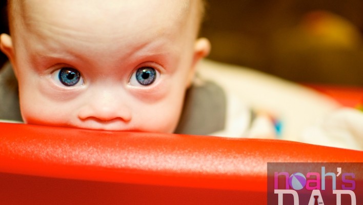 cute little boy playing in little tyke red wagon