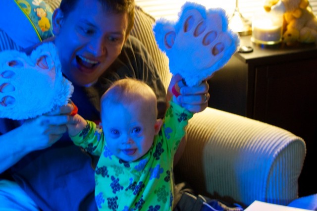 child with downs syndrome tickle monster gloves