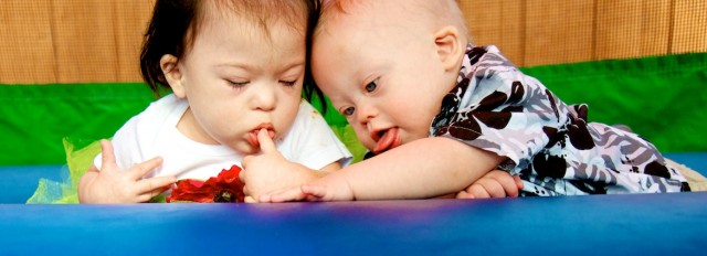 down syndrome baby babies playing bounce house