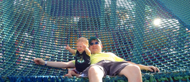 father and son at sea world having fun