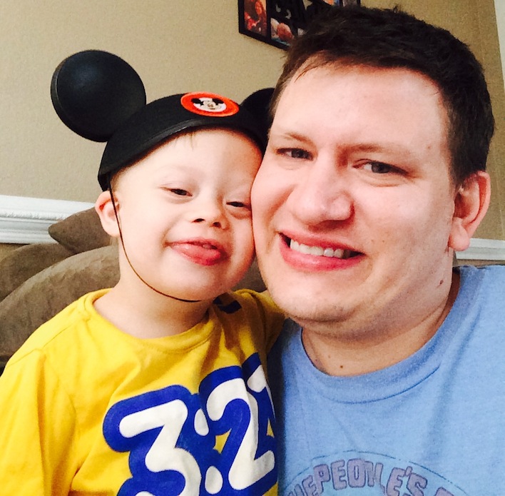child with down syndrome mickey mouse ears cute toddler