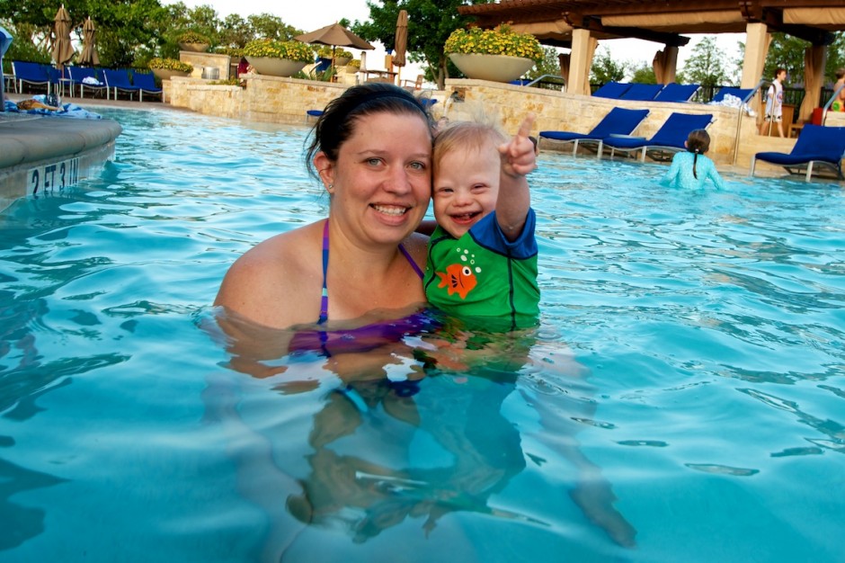 baby and mom with down syndrome in pool