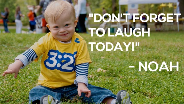 down syndrome kid laughing one year old