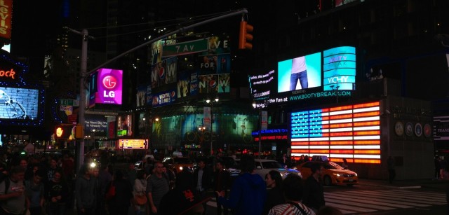 times-square-night-american-flag-side-of-building